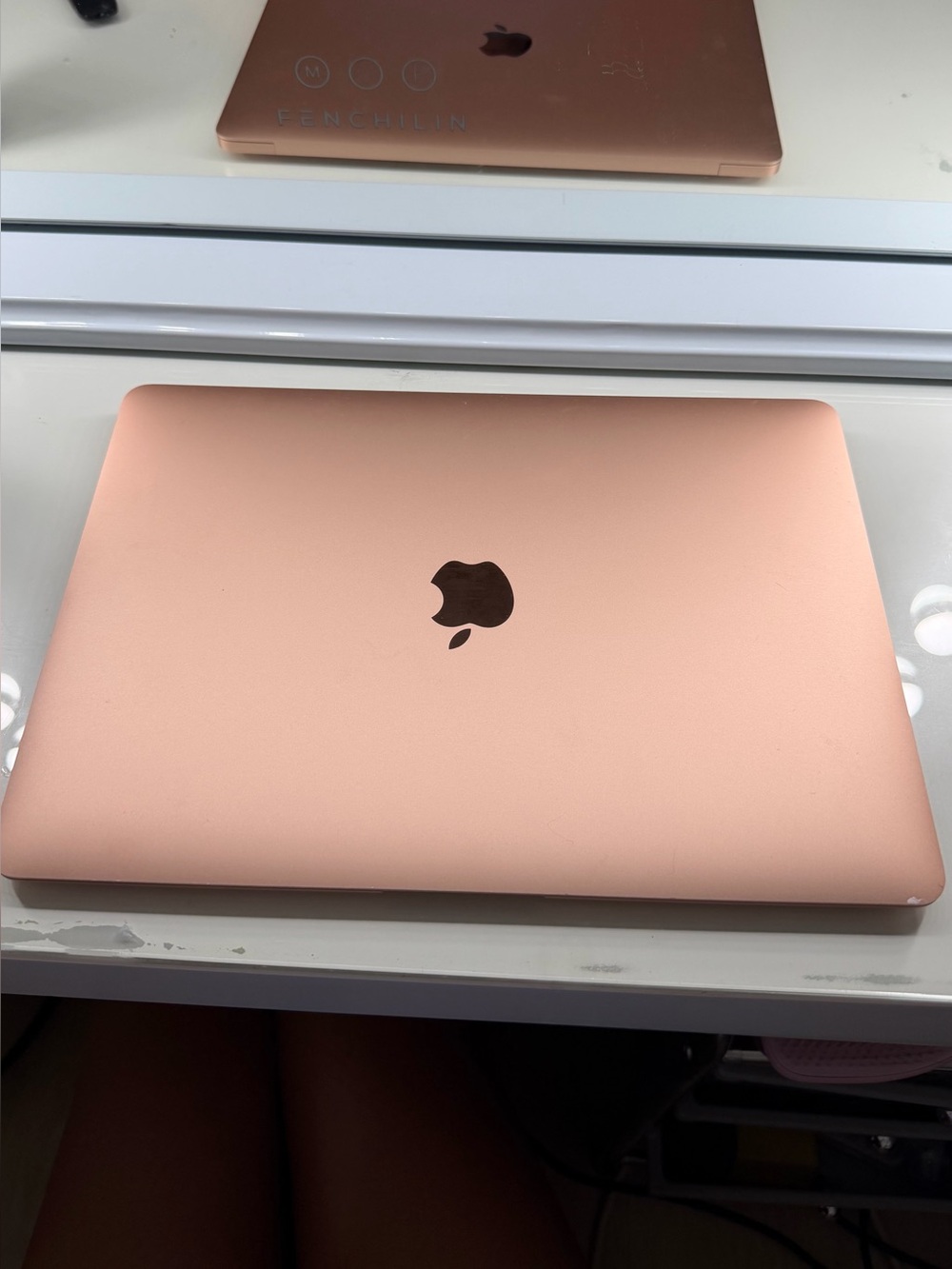 Apple Rose Gold Laptop with Apple Logo